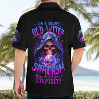 Black short-sleeve button-up Hawaiian shirt with large purple witch skull graphic on back view.