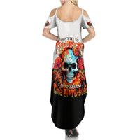 Women's black and white cold-shoulder maxi dress with colorful skull graphic