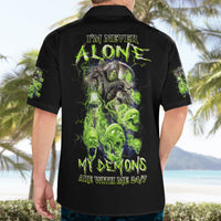 Black Hawaiian shirt with neon green demon back print and 'I'm Never Alone' text