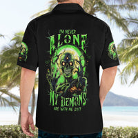 Black short-sleeve Hawaiian shirt with neon green “I’m never alone” zombie skull back print