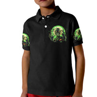 Kids black polo shirt with green zombie skull chest print and sleeve graphics