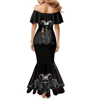 Black off-shoulder mermaid dress, back view with skull artwork and flared hem