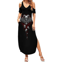 Black maxi dress with cold-shoulder cutouts, V-neck, side slit, skull graphic print