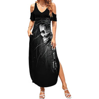 Black cold-shoulder maxi dress with skull graphic and V-neck