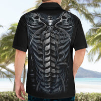 Black short-sleeve button-up shirt with skull and spine skeleton graphic on the back