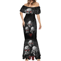 Black mermaid maxi dress with off-shoulder neckline and repeating skull artwork with red eyes