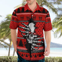 Red skeleton Hawaiian shirt on adult, short sleeves, button-front collar, bold winter print