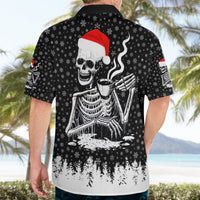 Black Hawaiian shirt back on model, skeleton Santa skull and red hat with snowflake print.