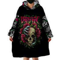 Black wearable hoodie blanket with large front skull-and-rose graphic and roomy hood.