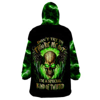 Black wearable blanket hoodie with green lightning hood and skull back print
