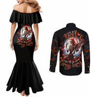 Black off-shoulder mermaid dress with skull fairy graphic; back of black button shirt