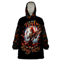 Black wearable blanket hoodie with hood and colorful fairy-skeleton front graphic