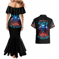 Black off-shoulder mermaid dress with skull graphic and matching black Hawaiian shirt