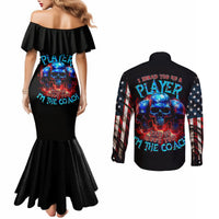 Black off-shoulder mermaid maxi dress with skull graphic and matching long-sleeve button shirt
