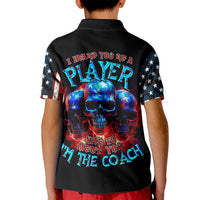Black kid polo shirt with back skull graphic and 'Nice to meet you I'm the coach'