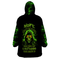 Black wearable blanket hoodie with green skull graphic, hood and front pocket