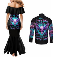 Black off-shoulder mermaid dress with skull floral print; black long-sleeve button shirt (back)
