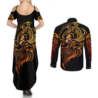Black maxi dress and black long-sleeve button shirt, both showing gold skull back graphic