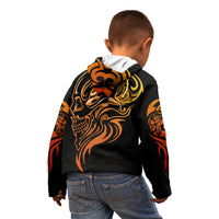 Black pullover hoodie with gold-orange skull tattoo on back and flame sleeve prints