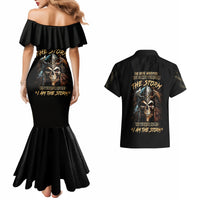Black off-shoulder mermaid dress and black button-up Hawaiian shirt with skull graphic