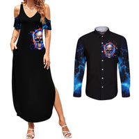 Black maxi dress with cold-shoulder sleeves and blue skull graphic, plus button-up shirt