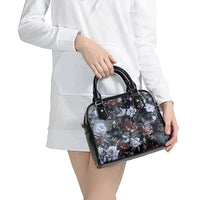 skulls-roses-and-white-snakes-shoulder-handbag