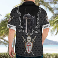 Black Hawaiian shirt with knight skull and shield crest graphic, worn from back by adult.