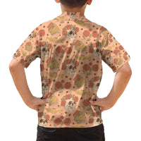 Back view of orange Hawaiian short-sleeve shirt with sugar skull and marigold print