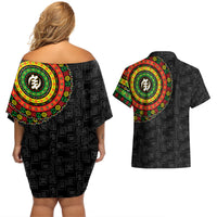 Black off-shoulder short dress, colorful symbol print back; matching short-sleeve shirt