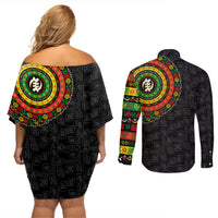Black off-shoulder short dress and long-sleeve button shirt with colorful circular symbols