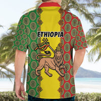 Yellow Hawaiian shirt back with ETHIOPIA text and lion emblem, red-green circular pattern