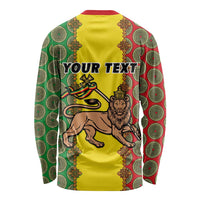 Yellow long-sleeve shirt with lion and green/red Ethiopian pattern, 'YOUR TEXT' print