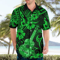 Green Hawaiian shirt on model, black collar, ukulele and floral tribal pattern, short sleeve