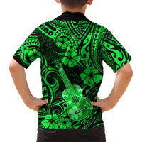 Green Hawaiian shirt back view, ukulele and hibiscus tribal swirls, short sleeves