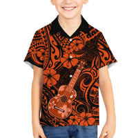 Orange and black Hawaiian button-up shirt on child, front hibiscus and ukulele print.