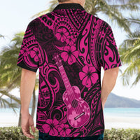 Men's pink Hawaiian shirt back view with black Polynesian pattern and ukulele hibiscus