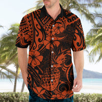 Orange and black pineapple floral Hawaiian shirt with button front and collared neckline