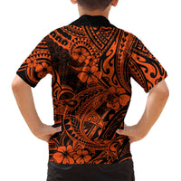 Orange and black tropical Hawaiian shirt for kids, back view with floral and tribal print