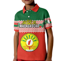 Kids red polo shirt with green collar, striped sleeves and Madagascar crest graphic