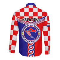 Back of red, white check and blue long-sleeve button shirt with coat-of-arms crest
