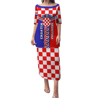 Long red, white and blue checker print dress with crest graphic, boat neckline, half sleeves