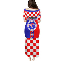 Long back view dress with red, white and blue check pattern and crest logo, short sleeves
