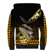 Black hoodie back with Aloha text, gold geometric trim, and shark artwork