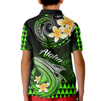 Kids green-black polo shirt with back Aloha, wave, and plumeria graphics