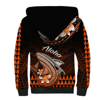 Sherpa-lined hoodie back view, black with orange tribal borders, Aloha text and shark art