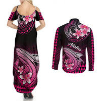 Back view: pink and black maxi dress and long-sleeve button shirt with Aloha print