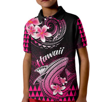 Kids black polo shirt with pink Polynesian shark, plumeria flowers, and Hawaii text