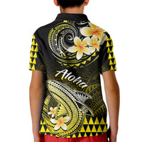Kids polo shirt back, black with yellow Polynesian shark, wave and flower artwork