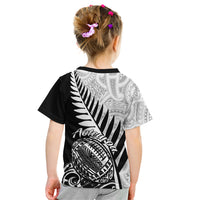 Kids black rugby T-shirt, back print with fern fronds and Aotearoa text, short sleeves