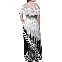 Women’s off-shoulder maxi dress, back view with black-and-white tribal print and ruffle